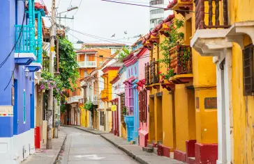 Photo by <a href="https://unsplash.com/@nacio1966?utm_content=creditCopyText&utm_medium=referral&utm_source=unsplash">Ricky Beron</a> on <a href="https://unsplash.com/photos/a-narrow-city-street-lined-with-colorful-buildings-acH94SHbWS4?utm_content=creditCopyText&utm_medium=referral&utm_source=unsplash">Unsplash</a>;