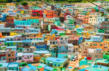 Photo by <a href="https://unsplash.com/@seontudio?utm_content=creditCopyText&utm_medium=referral&utm_source=unsplash">Sean Lee</a> on <a href="https://unsplash.com/photos/a-city-filled-with-lots-of-colorful-houses-Jr8as6DTews?utm_content=creditCopyText&utm_medium=referral&utm_source=unsplash">Unsplash</a>;