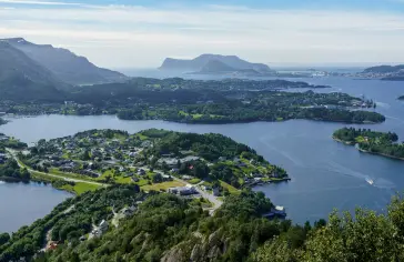 Photo by <a href="https://unsplash.com/@the_bracketeer?utm_content=creditCopyText&utm_medium=referral&utm_source=unsplash">Hendrik Cornelissen</a> on <a href="https://unsplash.com/photos/an-aerial-view-of-a-lake-surrounded-by-mountains-KES13ZwajcA?utm_content=creditCopyText&utm_medium=referral&utm_source=unsplash">Unsplash</a>;