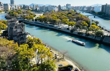 Photo by <a href="https://unsplash.com/@pappyrazi?utm_content=creditCopyText&utm_medium=referral&utm_source=unsplash">Desmond Tawiah</a> on <a href="https://unsplash.com/photos/a-river-running-through-a-city-next-to-tall-buildings-GKArFMrr3ps?utm_content=creditCopyText&utm_medium=referral&utm_source=unsplash">Unsplash</a>