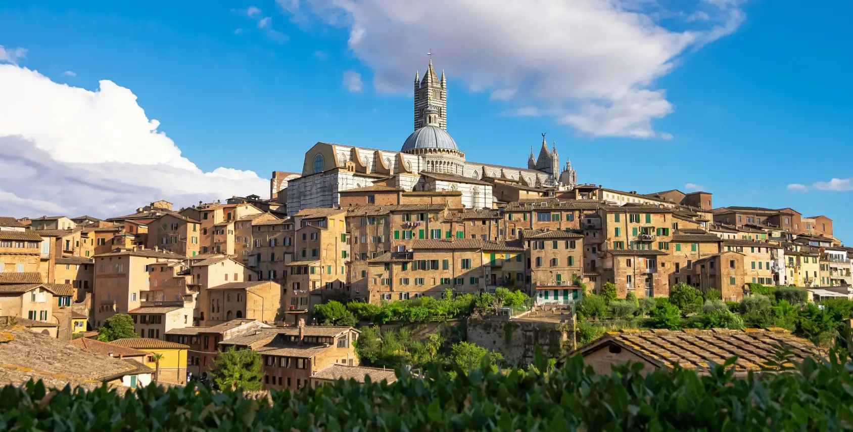 Photo by <a href="https://unsplash.com/@allered?utm_content=creditCopyText&utm_medium=referral&utm_source=unsplash">Alessandro Rossi</a> on <a href="https://unsplash.com/photos/brown-and-white-concrete-buildings-under-blue-sky-during-daytime-JU_Bgza3ZHE?utm_content=creditCopyText&utm_medium=referral&utm_source=unsplash">Unsplash</a>;